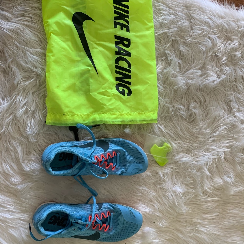 Blue and pink Nike Racing track spikes